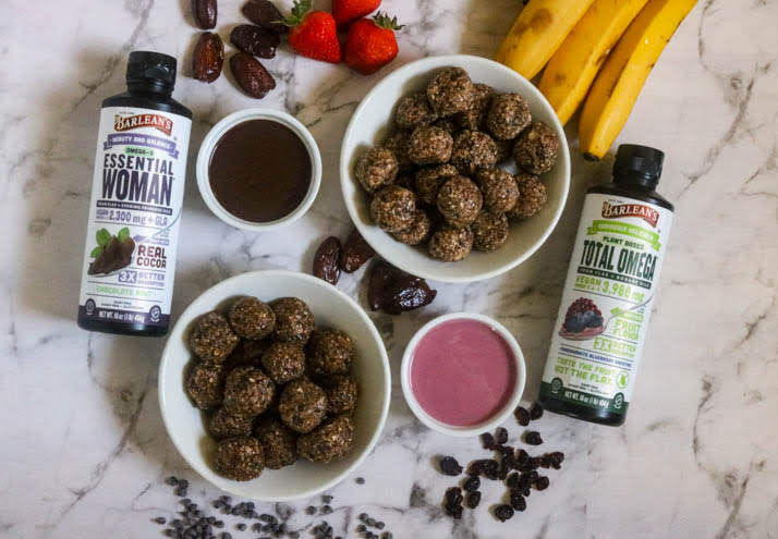 Barlean's Omega Swirl bottles next to bowl of power bites